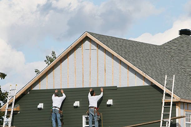 Professional Storm Damage Siding Repair technician working in Parksley, VA